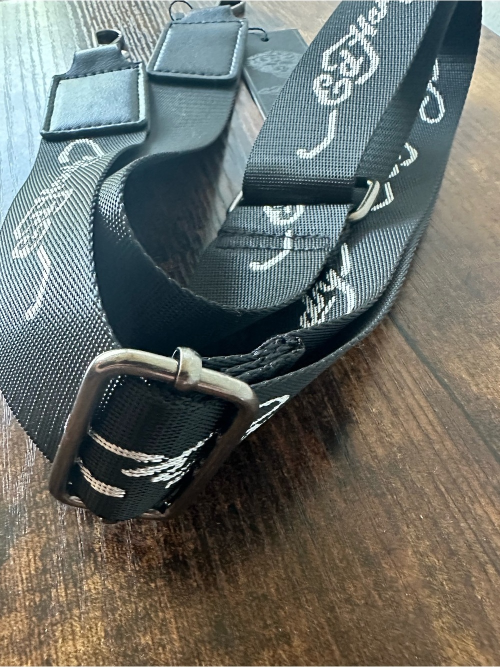Ed Hardy Black Crossbody Bag Strap with White Script Guitar Strap Style NWT - Picture 3 of 4